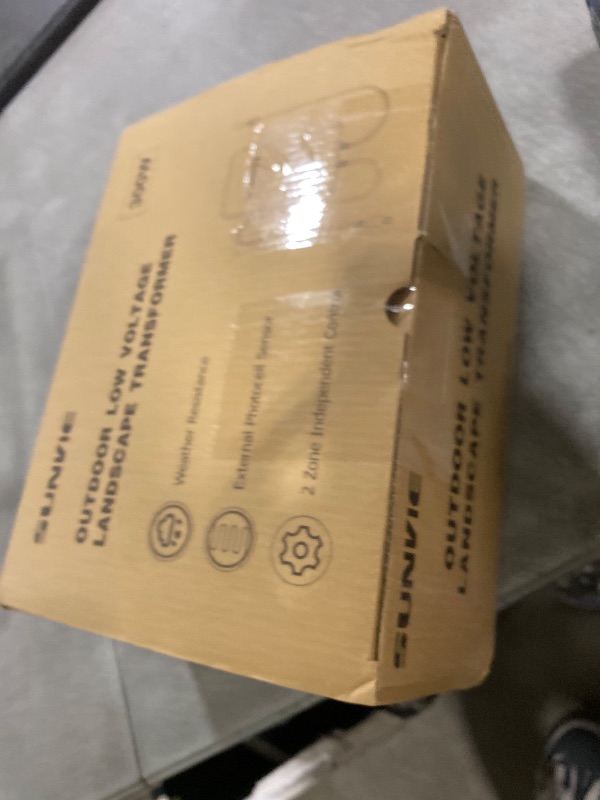 Photo 1 of SUNVIE 300W Low Voltage Landscape Transformer with 2 Independent Control Output Landscape Lighting Transformer with Timer and Photocell Sensor 120V AC to 12/14V AC Weatherproof Low Voltage Transformer