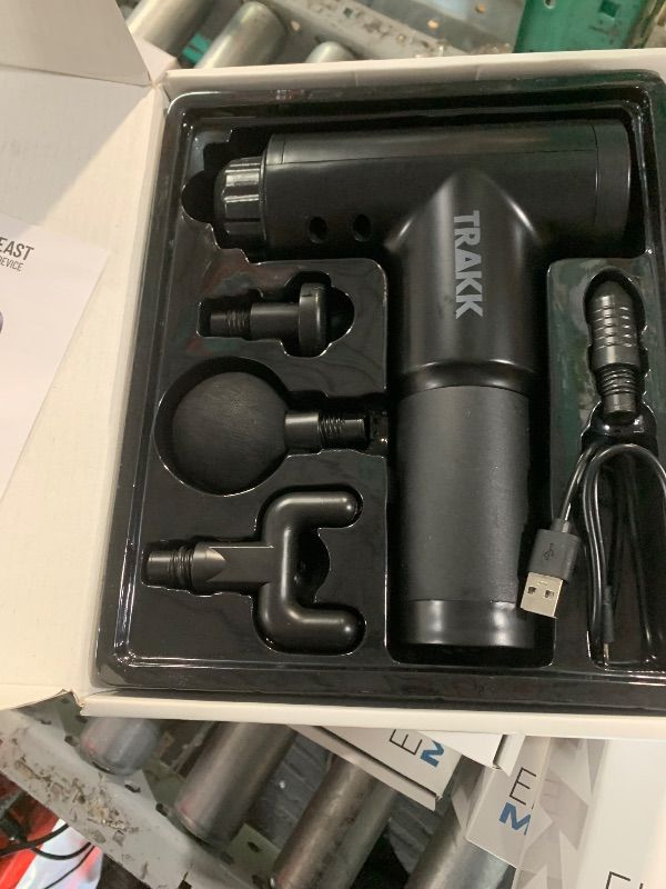 Photo 1 of TRAKK Beast Deep Tissue Percussion Massage Gun, Rechargeable Handheld 6 Speed Cordless Massager, 4 Interchangeable Heads (Black)