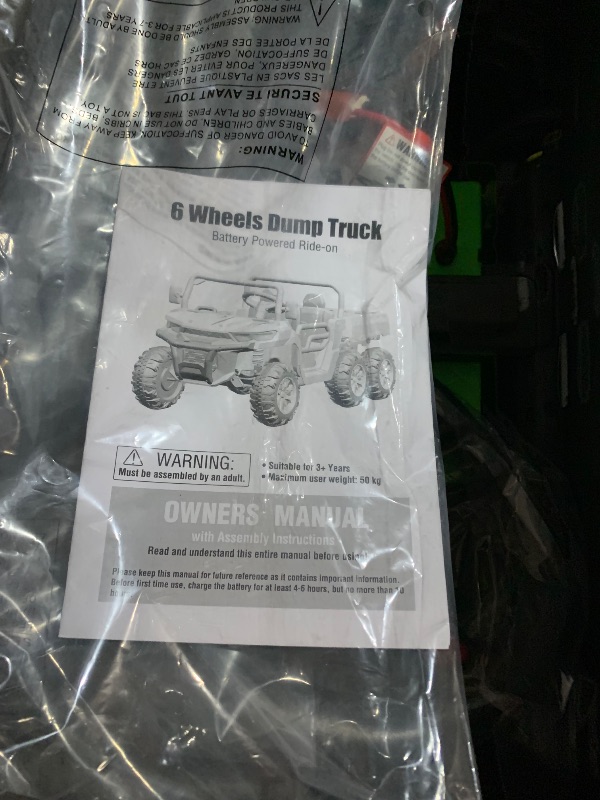 Photo 1 of **FOR PARTS ONLY**
Gravee 24V 4WD Electric Ride On Dump Truck with Remote Control, 2-Seater Kids Ride On Car for Ages 3+, All-Terrain Toy Truck w/Dump Bed, Bluetooth & LED Lights, Birthday Gift ** Missing bolts to put together and parent remote **