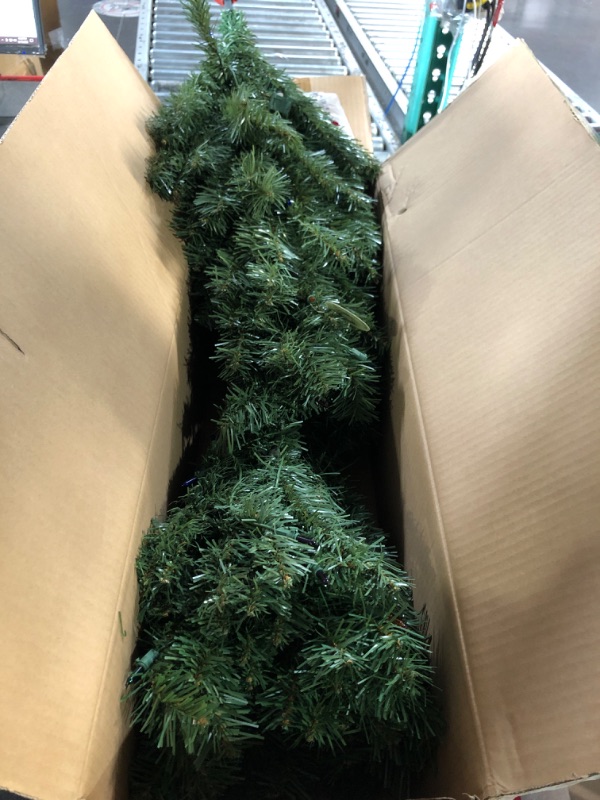 View 2 of National Tree Company Pre-Lit Artificial Medium Christmas Tree, Green, Kincaid Spruce, Multicolor Lights, Includes Stand, 4 Feet