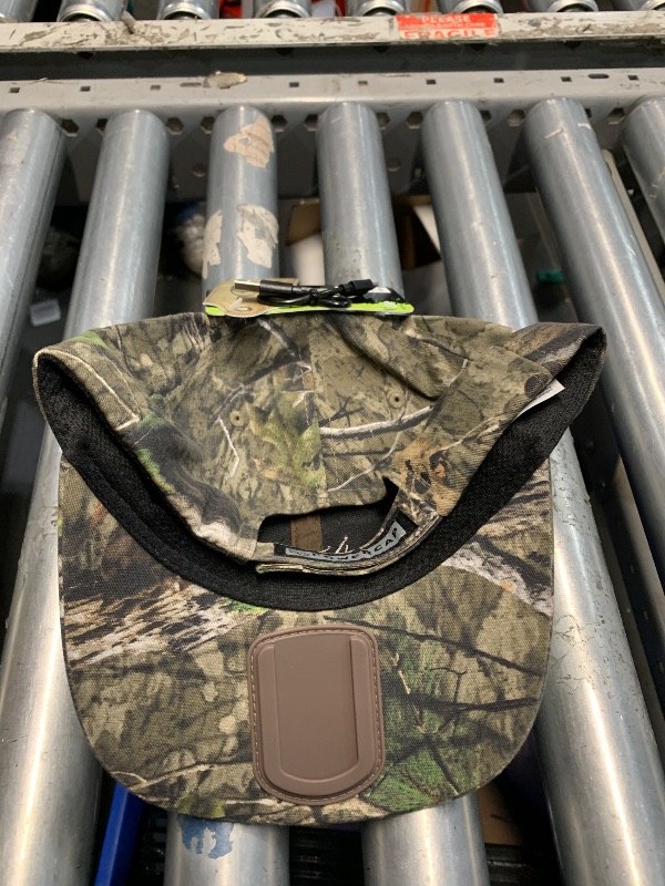 Photo 1 of *USED MISSING LIGHT*LED Hat Light - POWERCAP 3.0 USB Rechargeable Baseball Cap with Light Built in - LED Cap Visor Light with Bright Headlight and IPX4 Rating (Mossy Oak DNA - HLCR5-9664-AMZ)