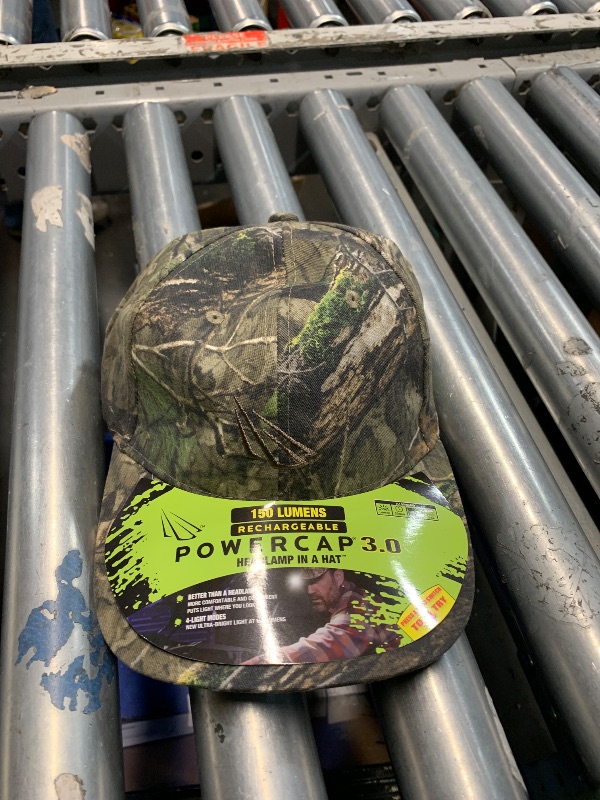 Photo 1 of *USED MISSING LIGHT*LED Hat Light - POWERCAP 3.0 USB Rechargeable Baseball Cap with Light Built in - LED Cap Visor Light with Bright Headlight and IPX4 Rating (Mossy Oak DNA - HLCR5-9664-AMZ)