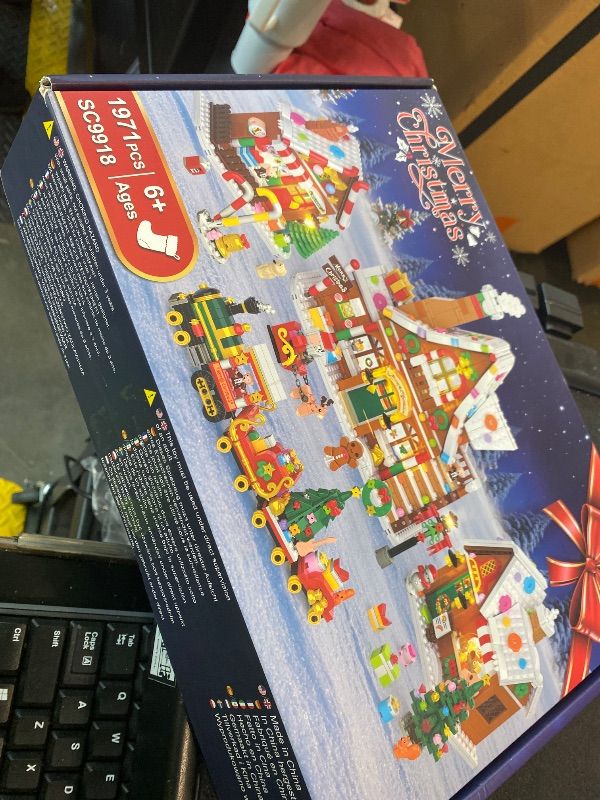 Photo 1 of *MISSING PARTS UNKNOWN*
PLAXSOON Christmas Gingerbread House Village Mini Building Set with Lights, 1955 PCS Holiday Village Building Block Toy with Xmas Tree Train Santa for Home Decor, Gift for Adults Kids Girls Boys 14+