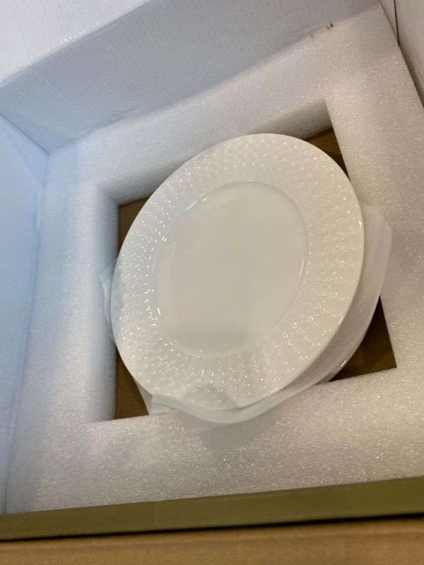 Photo 1 of ***MISSING ONE PLATE & ONE BOWL*** KINGSTONE 12-piece Bone China Dinnerware Set and 20-piece silverware, White Lightweight Porcelain for 4, Plates, Bowls with matching flatware, Microwave and Dishwasher Safe, for Family, Gifting