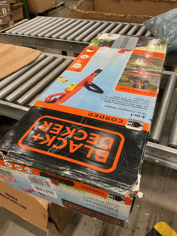 Photo 1 of *Unknown if ANYTHING MISSING SPECIFY WHEN RETURNING* 
BLACK+DECKER Electric Lawn Mower, Weed Eater and Edger 3-in-1 Combo, Corded 12-Inch 6.5 Amp Electric Weed Wacker and Compact Push Mower (BESTA512CM)