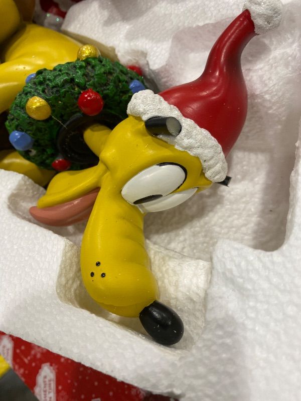 Photo 1 of *MINOR DAMAGE - USED*
MOMENTS IN TIME Disney Mickey Minnie & Pluto Christmas Figurine Santa Outfit Sled Decoration 10”H Hand-Painted Polyresin Holiday Home Decor Disney Holiday Collectible Tabletop Decor