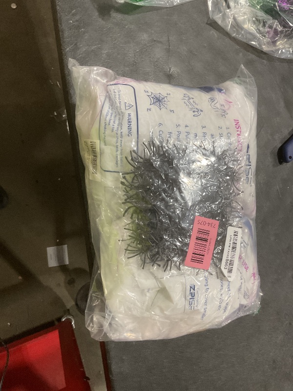 Photo 1 of 1000 sqft Spider Webs Halloween Decorations with 77 Fake Spiders, Super Stretch Cobwebs for Halloween Indoor and Outdoor Decor