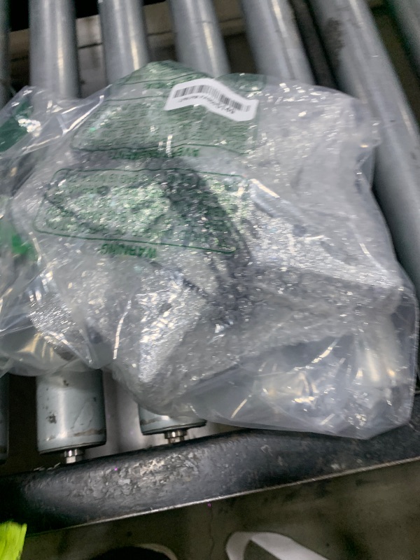 Photo 1 of 10" Christmas Tree Topper Projector with 6 Projection Modes, Lighted Christmas Tree Topper Star Built-in LED Rotation Light, 3D Glitter Dynamic TreeTop for Xmas Holiday Party Decorations Gift (Silver)