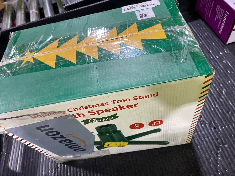 Photo 1 of ?Patent Pending? Musical Rotating Christmas Tree Stand, UL Certified Up to 9ft 120 lb Artificial Christmas Tree with Speaker, Spinning Stand with Remote, Fit for 1.25-2" in Tree Poles - 800W