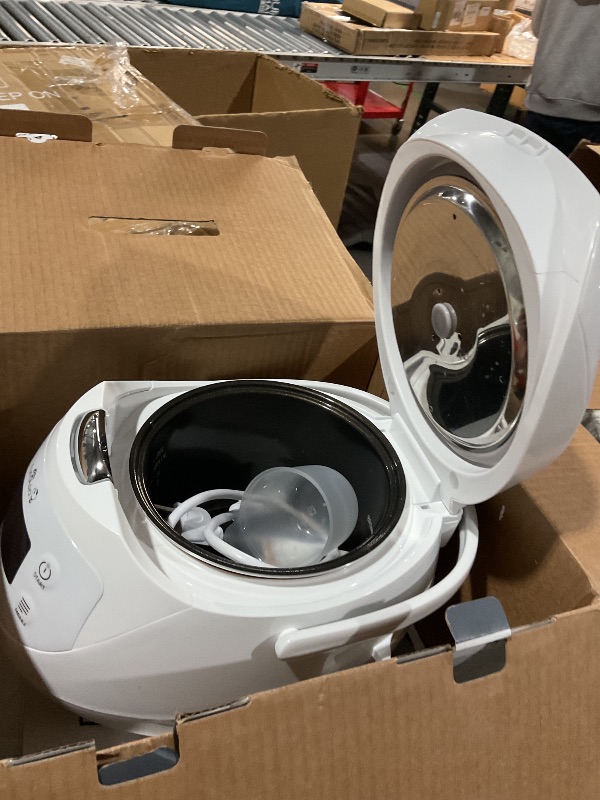 Photo 1 of **MINOR. RACK ON OUTSIDE**

Yum Asia Panda Mini Rice Cooker With Ninja Ceramic Bowl and Advanced Fuzzy Logic (3.5 cup, 0.63 litre) 4 Rice Cooking Functions, 4 Multicooker functions, Digital LED display - 120V