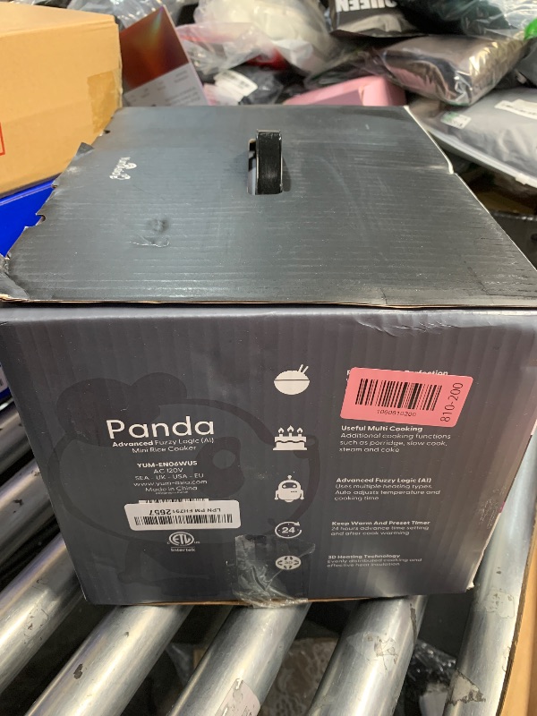 Photo 1 of **MINOR. RACK ON OUTSIDE**

Yum Asia Panda Mini Rice Cooker With Ninja Ceramic Bowl and Advanced Fuzzy Logic (3.5 cup, 0.63 litre) 4 Rice Cooking Functions, 4 Multicooker functions, Digital LED display - 120V