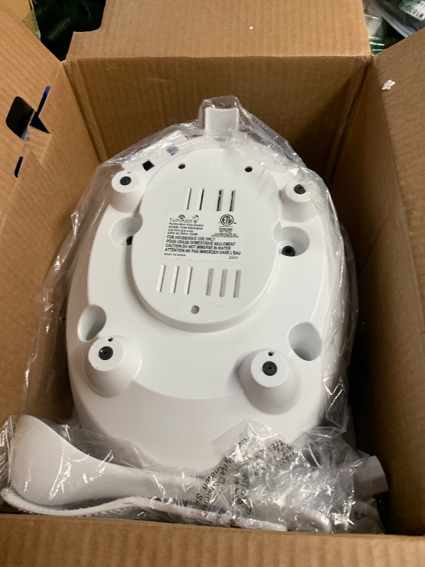 Photo 1 of **MINOR. RACK ON OUTSIDE**

Yum Asia Panda Mini Rice Cooker With Ninja Ceramic Bowl and Advanced Fuzzy Logic (3.5 cup, 0.63 litre) 4 Rice Cooking Functions, 4 Multicooker functions, Digital LED display - 120V