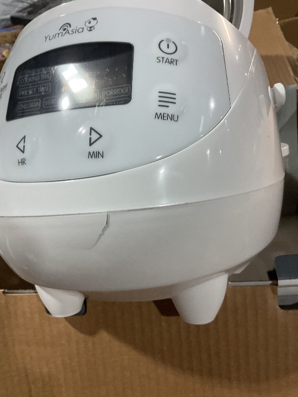 Photo 1 of **MINOR. RACK ON OUTSIDE**

Yum Asia Panda Mini Rice Cooker With Ninja Ceramic Bowl and Advanced Fuzzy Logic (3.5 cup, 0.63 litre) 4 Rice Cooking Functions, 4 Multicooker functions, Digital LED display - 120V