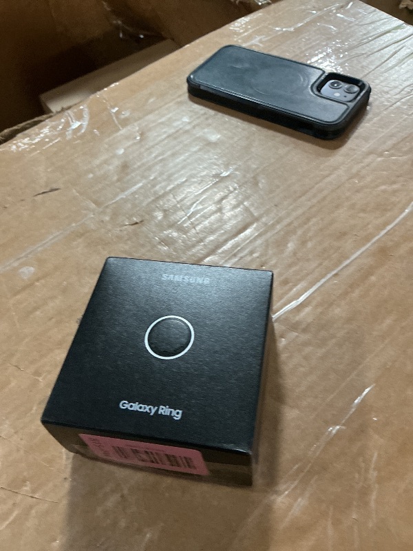 Photo 1 of **Ring does not charge and does not connect to phone**
SAMSUNG Galaxy Ring, AI Smart Ring, Size First w/Sizing Kit, No App Subscription, Fitness Monitor, Sleep Tracker, Up to 7-Day Battery, Size 13, Titanium Black [US Version, 1Yr Manufacturer Warranty]
