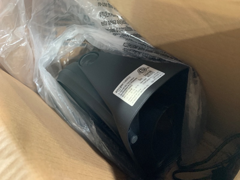 Photo 1 of ***DAMAGED - SEE NOTES/PICTURES*** Amazon Basics Air Circulator Fan, Desk Fan for Bedroom, Home and Office, With 90-Degree Tilt Head, 3 Speed Settings, Lightweight (4.2 LBS), 70 Watts, Black, 14.8"Wx7.6"Dx14.1"H