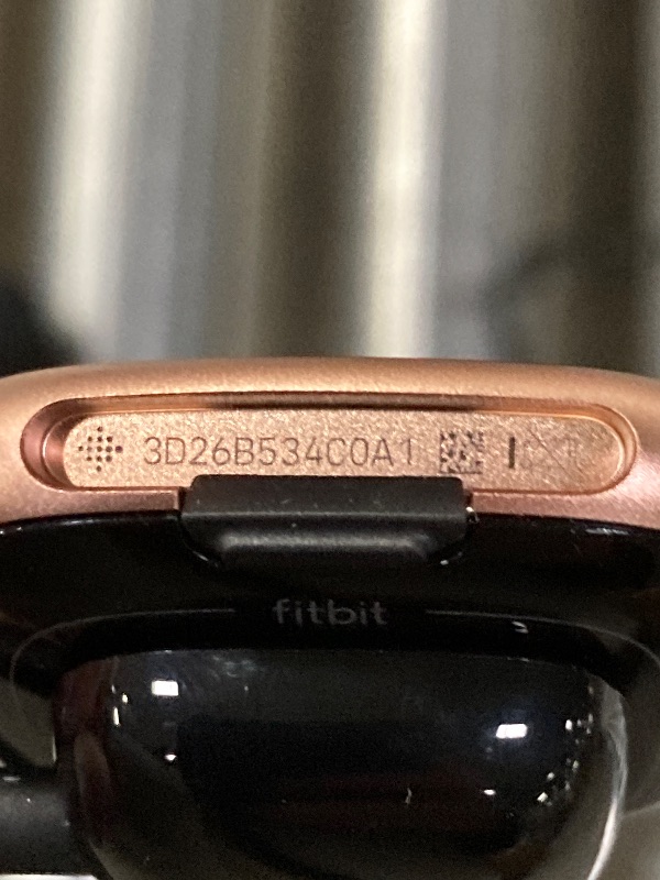 Photo 1 of ***DOES NOT POWER ON***Fitbit Versa 4 Fitness Smartwatch with Daily Readiness, GPS, 24/7 Heart Rate, 40+ Exercise Modes, Sleep Tracking and more, Pink Sand/Copper Rose, One Size (S & L Bands Included)***DOES NOT POWER ON***