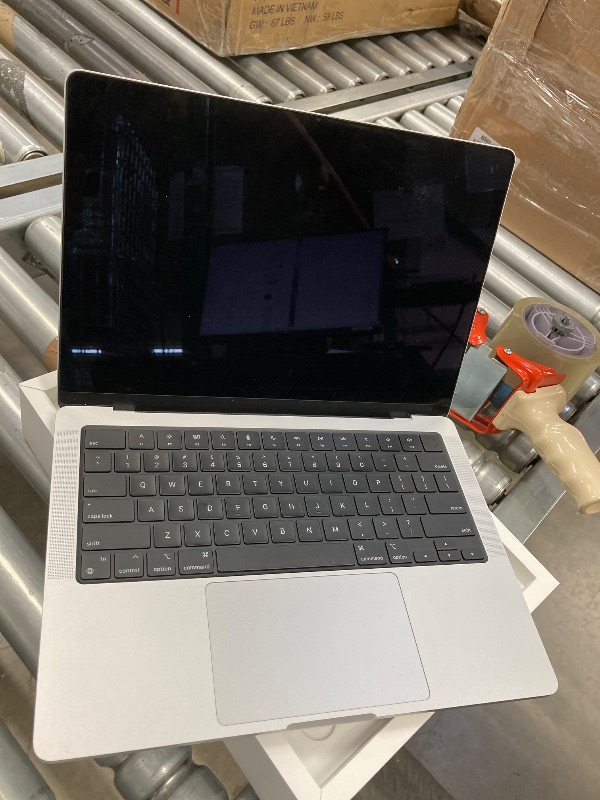 Photo 1 of **Missing Charger** Apple 2024 MacBook Pro Laptop with M4 Pro, 12?core CPU, 16?core GPU: Built for Apple Intelligence, 14.2-inch Liquid Retina XDR Display, 24GB Unified Memory, 512GB SSD Storage; Silver