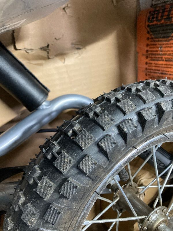 Photo 1 of ***MISSING CHARGER***Razor MX350 Dirt Rocket Electric Bike for Kids Ages 8+, 140 lb Max Weight, Blue – 24V Battery, Up to 14 Mph, 30-Min Ride Time on High Speed, Twist-Grip Throttle, Spoked Wheels w/ 12” Pneumatic Tires***MISSING CHARGER***