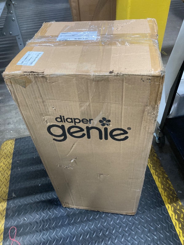 Photo 1 of ***DAMAGE, SOME DENTS ON SIDE, SELLINGH AS IS*** Diaper Genie Platinum Pail (Lily White) is Made in Durable Stainless Steel and Includes 1 Easy Roll Refill with 18 Bags That can Last up to 5 Months. ***DAMAGE, SOME DENTS ON SIDE, SELLINGH AS IS***