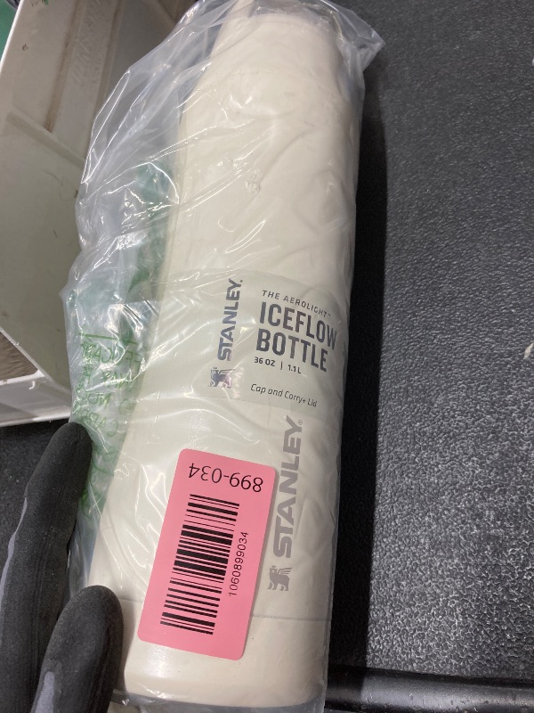 Photo 1 of *Small scratches* STANLEY IceFlow Cap and Carry Water Bottle 36 oz | Wide Mouth Twist Lid | Lightweight and Leakproof for Travel and Sports | Insulated Stainless Steel | BPA-Free | Cream Glimmer