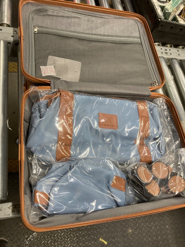 Photo 1 of *Skuffed* Joyway 3-Piece Luggage Set 20-Inch Carry-On Suitcase with Spinner Wheels TSA Lock Travel Duffel Bag and Toiletry Bag Hardside Lightweight Luggage Ice Blue
