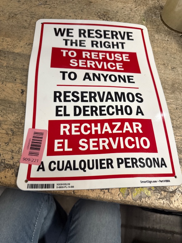 Photo 1 of "We Reserve The Right to Refuse Service to Anyone" Bilingual Sign by SmartSign | 10" x 14" Plastic