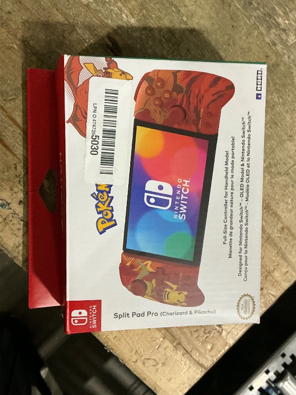 Photo 1 of ***MINOR DAMAGE (LEFT JOYSTICK DAMAGED) *** Nintendo Switch Split Pad Pro (Pikachu & Charizard) - Ergonomic Controller for Handheld Mode - Officially Licensed by Nintendo & Pokémon