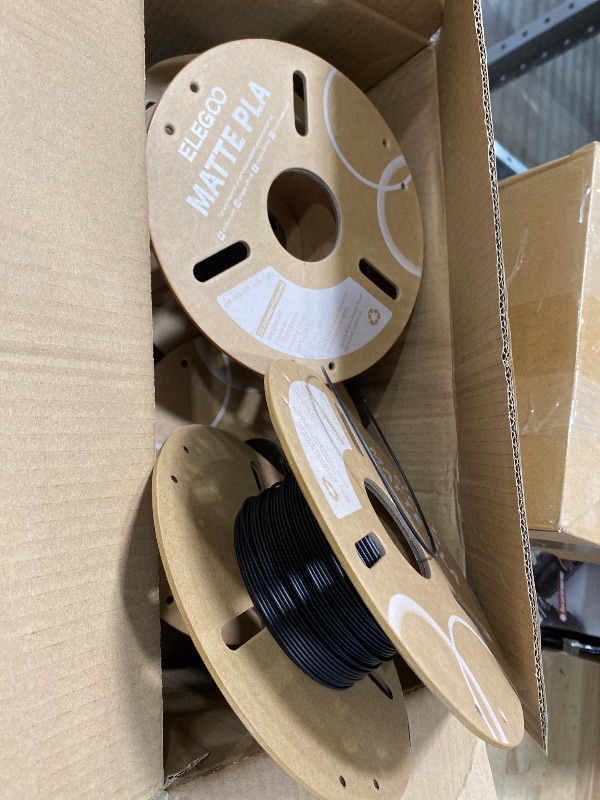 Photo 1 of **USED/UNKNOWN AMT.**ELEGOO Matte PLA Filament Matte Black 4KG, 1.75mm 3D Printer Filament Dimensional Accuracy +/- 0.02mm, 4pcs 1kg Carboard Spool (2.2lbs) for Most FDM 3D Printers