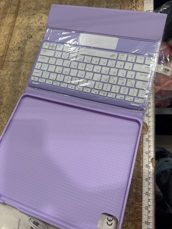 Photo 1 of *UNKNOWN MODEL** LAVENDER TABLET KEYBOARD CASE