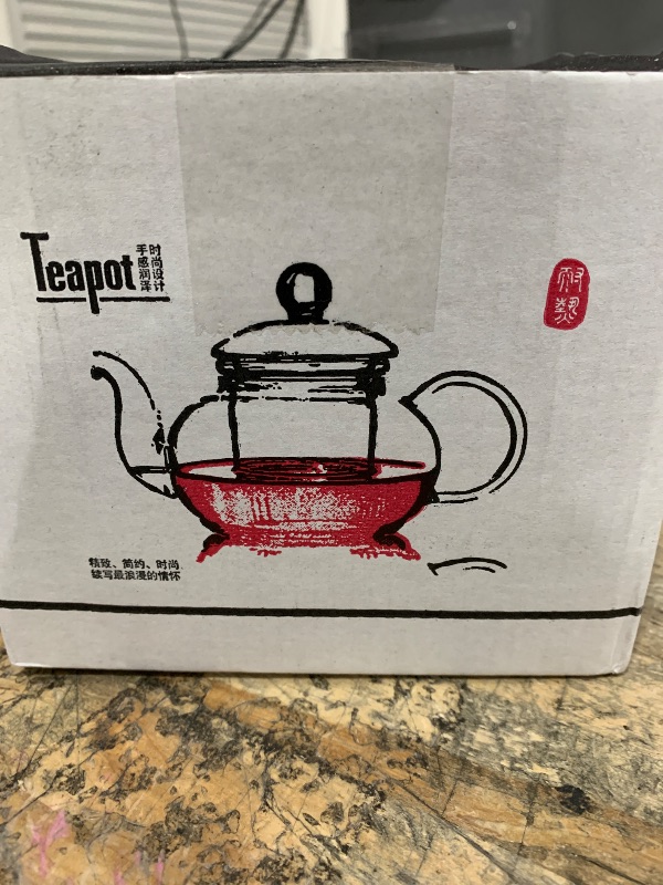 Photo 1 of  Glass Filtering Tea Maker Teapot with a Warmer and 6 Tea Cups Set 