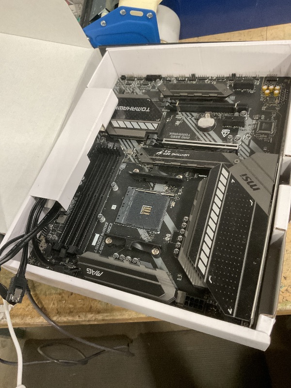 Photo 1 of ***FOR PARTS ONLY/ NON-FUNCTIONAL***** MSI MAG B550 TOMAHAWK Gaming Motherboard (AMD AM4, DDR4, PCIe 4.0, SATA 6Gb/s, M.2, USB 3.2 Gen 2, HDMI/DP, ATX, AMD Ryzen 5000 Series processors)