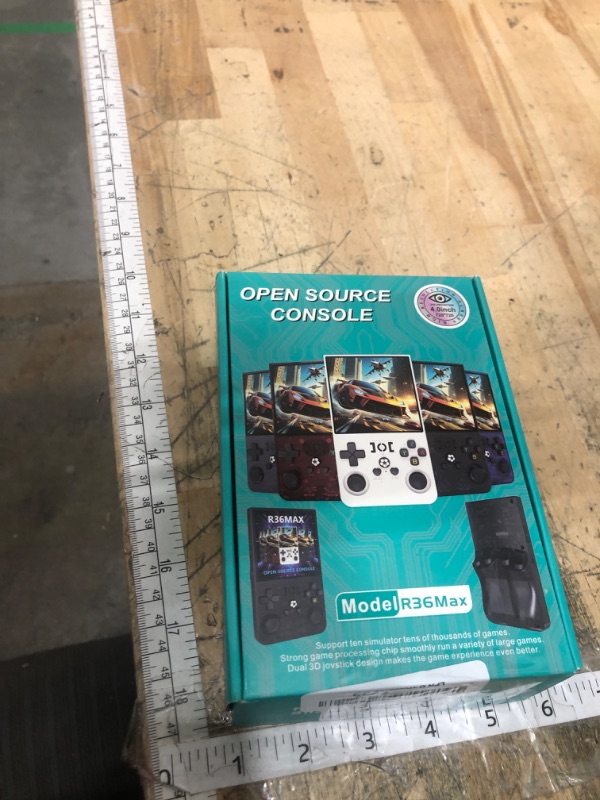 Photo 1 of **** FOR PARTS/WON'T POWER ON OR CHARGE*** R36MAX Retro Game Console, Handheld Game Console with 4.0-in IPS HD Screen?Video Game Consoles with 64GB Memory, Portable Games Consoles with Storage Bag?Black?