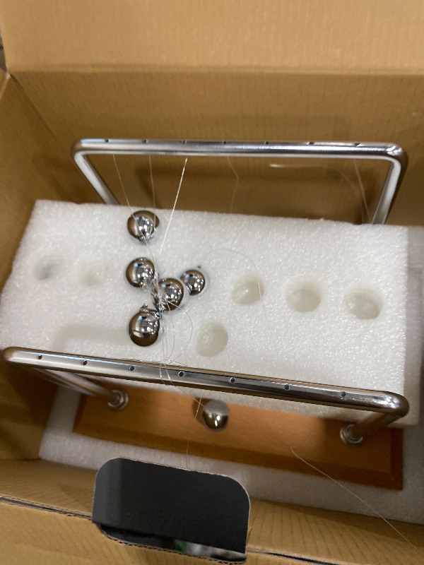 Photo 1 of ****parts only*** CERROPI Large Newtons Cradle Pendulum with 7 Balls, Physics Perpetual Motion Desk Toys for Office, Calm Down Fidgets, 50+ Sec Swingtime (Beech Base)