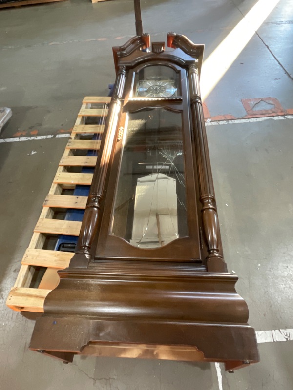 Photo 1 of ***1 BROKEN MIRROR AND MISSING KEY***Howard Miller Vuchinich Grandfather Clock II, Wood Finish with Triple Chime Movement Floor Clocks, Swan-Neck Pediment Perfect for Home Decor, Living Room & Office Heirloom Modern Timepiece