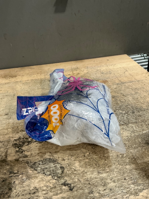 Photo 1 of 1000 sqft Spider Webs Halloween Decorations Bonus with 30 Fake Spiders, Super Stretch Cobwebs for Halloween Indoor and Outdoor Party Supplies