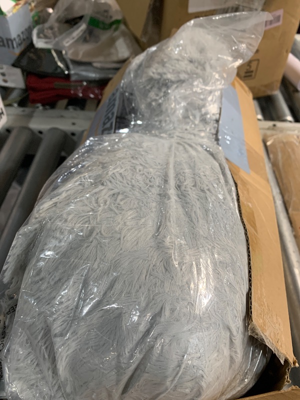 Photo 1 of ***(HEAVILY USED/ MINOR DAMAGE)***Bedsure Calming Dog Bed for Small Dogs - Donut Washable Small Pet Bed, 23 inches Anti-Slip Round Fluffy Plush Faux Fur Large Cat Bed, Fits up to 25 lbs Pets, Pale Grey