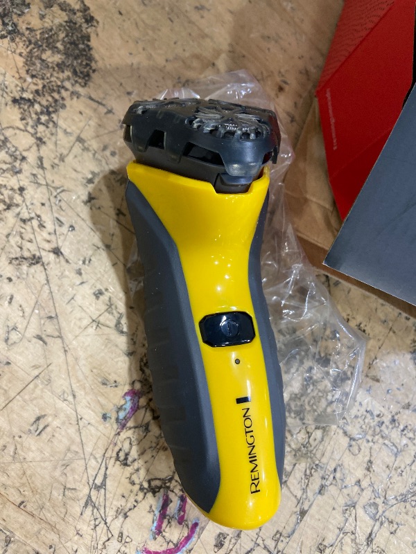 Photo 1 of ***(HEAVILY USED/ MINOR DAMAGE/ MISSING POWER CORD/ UNABLE TO TEST)***
Remington Virtually Indestructible Rotary Shaver 5100, Electric Razor for Men, 100% Waterproof Design, Yellow