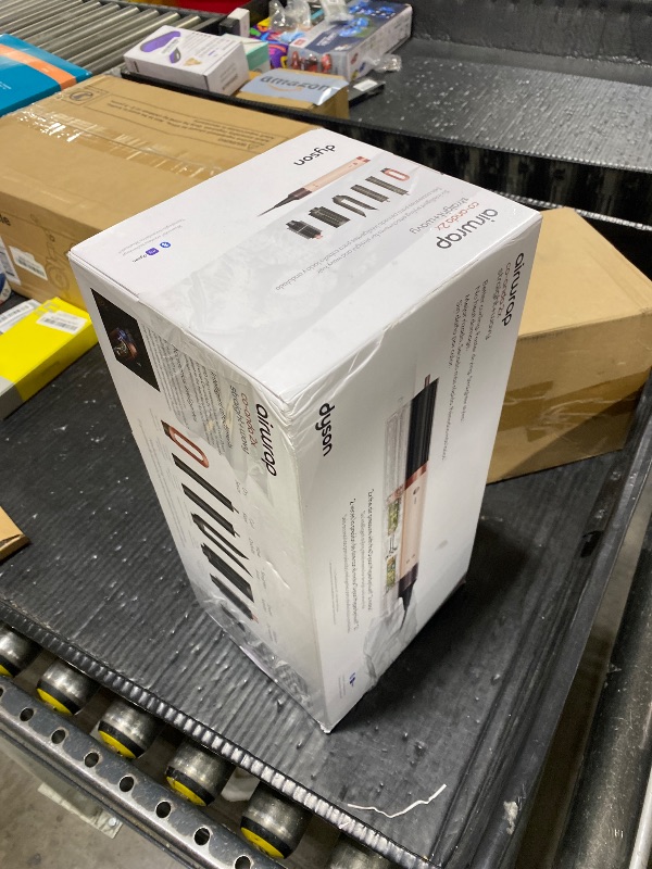 Photo 1 of Dyson Airwrap Co-anda2x™ Multi-Styler and Dryer Straight+Wavy in Ceramic Pink