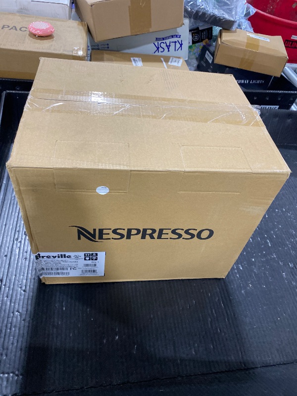 Photo 1 of Nespresso Vertuo Pop+ Deluxe Coffee and Espresso Maker by Breville with Milk Frother, Titan