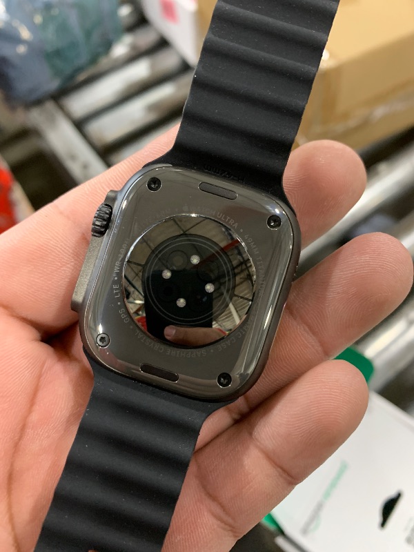Photo 1 of Apple Watch Ultra 2 (GPS + Cellular, 49MM) - Black Titanium Case with Black Ocean Band (Renewed Premium)