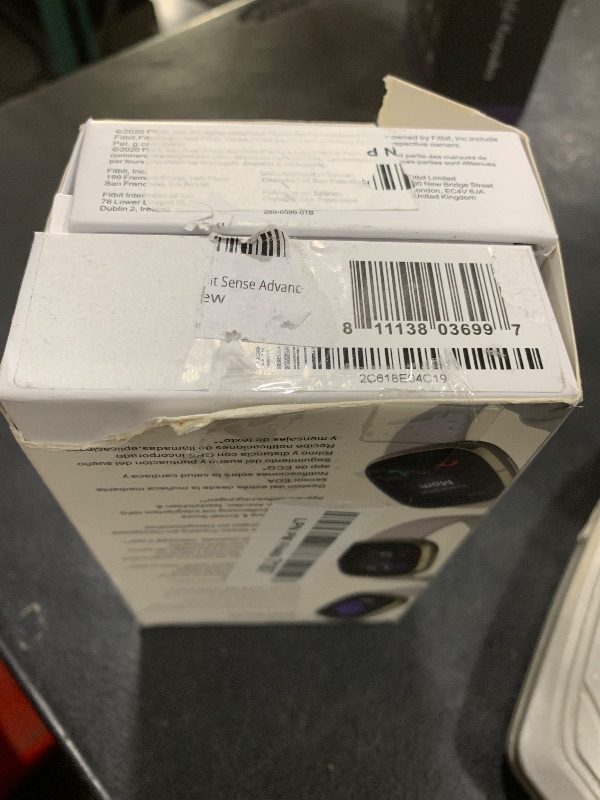 Photo 1 of Fitbit Sense Advanced Smartwatch with Tools for Heart Health, Stress Management & Skin Temperature Trends, White/Gold, One Size (S & L Bands Included)