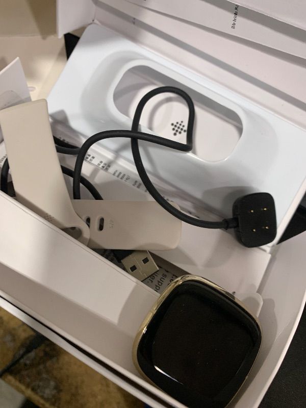 Photo 1 of Fitbit Sense Advanced Smartwatch with Tools for Heart Health, Stress Management & Skin Temperature Trends, White/Gold, One Size (S & L Bands Included)