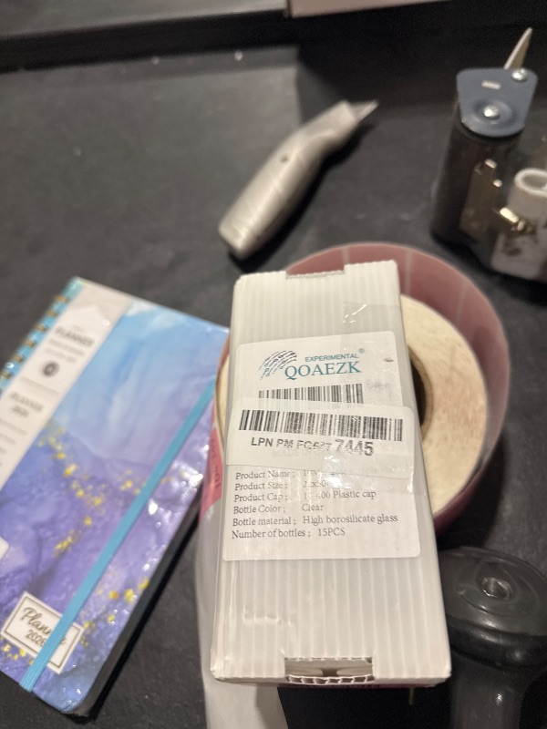 Photo 1 of QOAEZK 15 PCS 10ML Glass Vials, Small Liquid Sample Vial,22x52 mm Borosilicate Glass Empty Vials with Caps, Leak-Proof Vial,18-400 Black Screw Caps with PE Liner