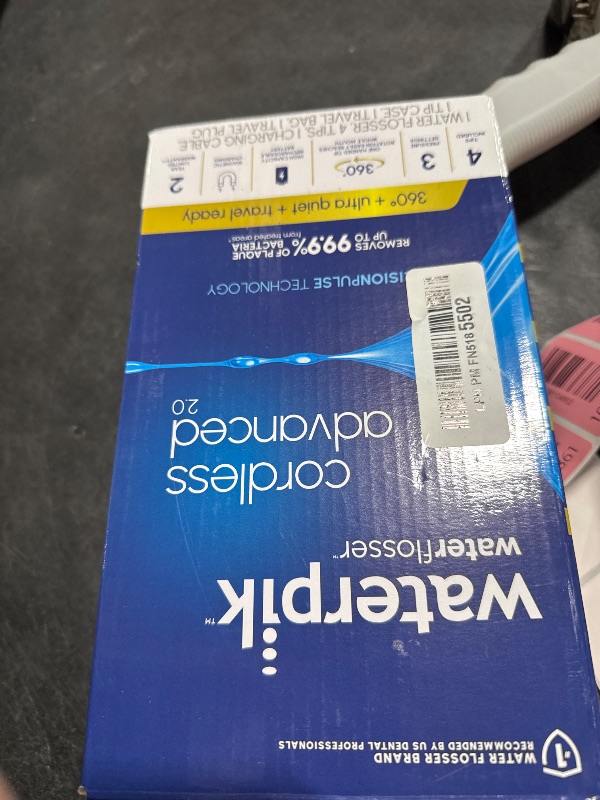 Photo 1 of Waterpik Cordless Advanced 2.0 Water Flosser For Teeth, Gums, Braces, Dental Care With Travel Bag and 4 Tips, ADA Accepted, Rechargeable, Portable, and Waterproof, Black WP-582, Packaging May Vary