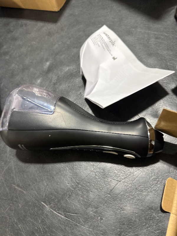 Photo 1 of Waterpik Cordless Advanced 2.0 Water Flosser For Teeth, Gums, Braces, Dental Care With Travel Bag and 4 Tips, ADA Accepted, Rechargeable, Portable, and Waterproof, Black WP-582, Packaging May Vary