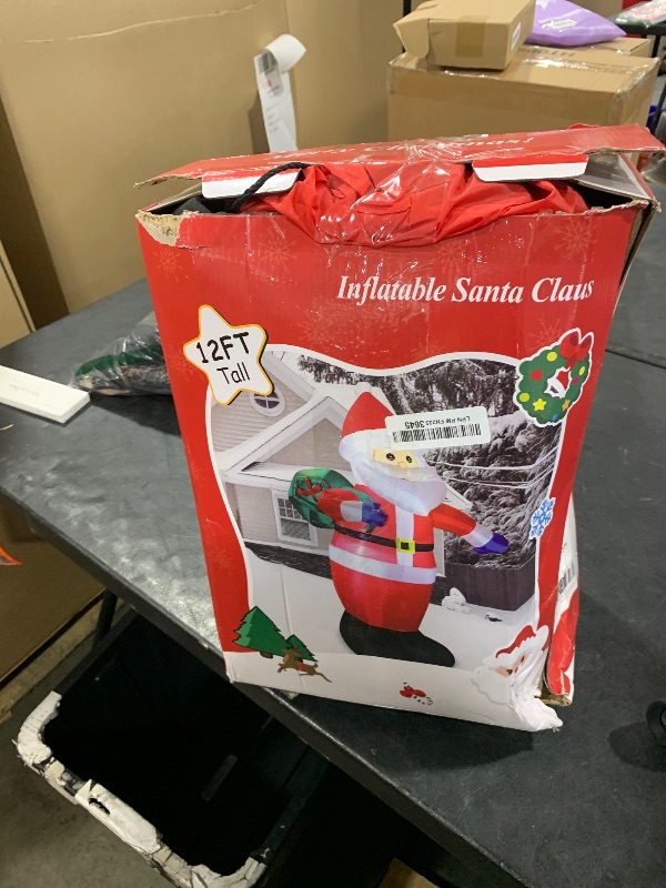 Photo 1 of 12 Feet Giant Christmas Inflatables Santa Claus Outdoor Decorations, Blow Up Huge Santa Claus with Gift Bag, Built-in Bright LED Lights, Xmas Santa Outside Decor for Holiday Party Yard Garden Lawn