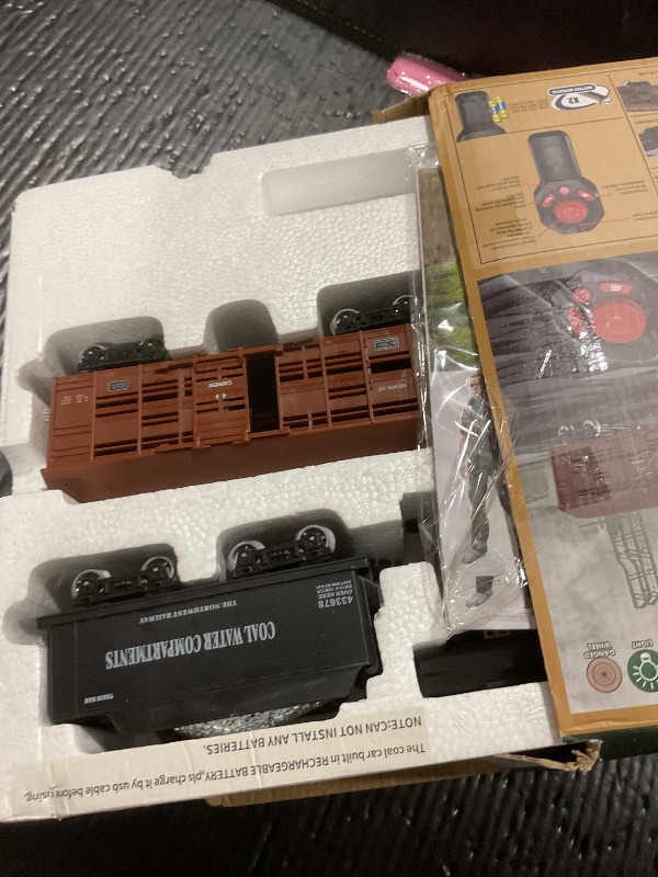 Photo 1 of JONEALA Train Set with Remote Control,Electric Train Track Around Christmas Tree W/Cargo Vehicle,Light & Sounds,Alloy Steam Locomotive Engine Train Toy Gift for Boys Girls 4 5 6 7 8 9 10