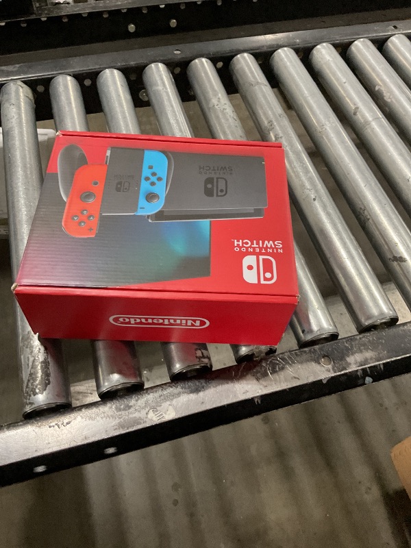Photo 1 of Nintendo Switch with Neon Blue and Neon Red Joy-Con - Handheld Gaming Console