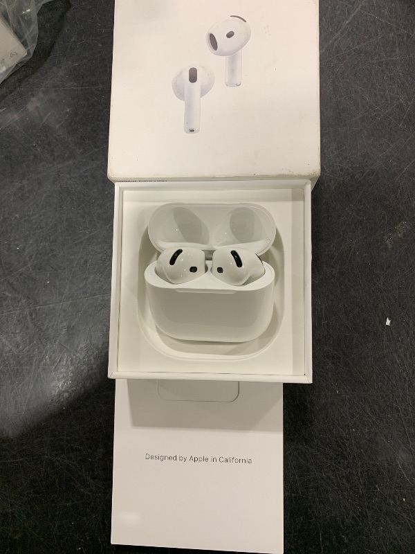 Photo 1 of Apple AirPods 4 Wireless Earbuds, Bluetooth Headphones, with Active Noise Cancellation, Adaptive Audio, Transparency Mode, Personalized Spatial Audio, USB-C Charging Case, Wireless Charging, H2 Chip
