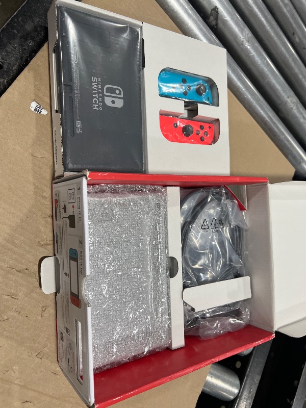 Photo 1 of Nintendo Switch™ with Neon Blue and Neon Red Joy?Con™